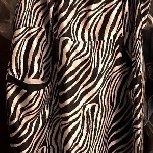 Black/white zebra striped dress, just below knee for someone 5’6. Black border